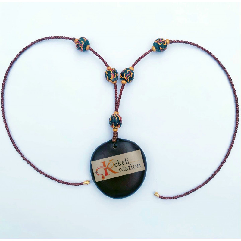 Collier "Kodje" en graine "oeil de boeuf" avec perles de verre et perles de rocaille